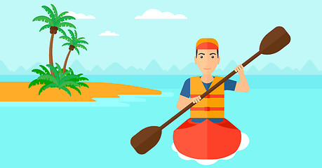 Image showing Man riding in canoe.