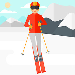 Image showing Young woman skiing.