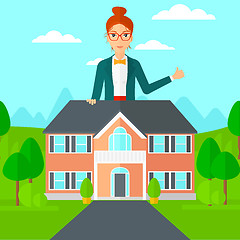 Image showing Real estate agent showing thumb up.