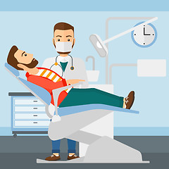 Image showing Dentist and man in dentist chair.