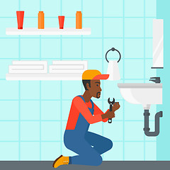 Image showing Man repairing sink.
