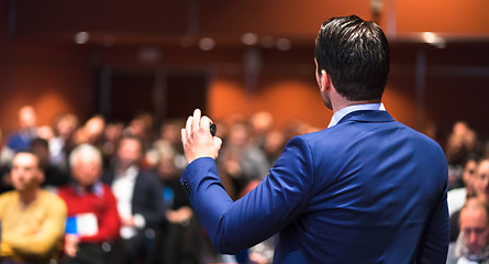 Image showing Public speaker giving talk at Business Event.