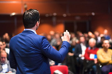 Image showing Public speaker giving talk at Business Event.