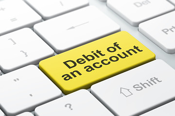 Image showing Currency concept: Debit of An account on computer keyboard background
