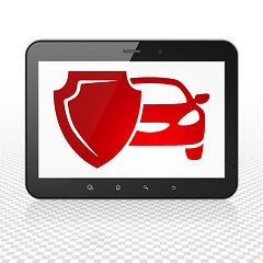 Image showing Insurance concept: Tablet Computer with Car And Shield on display