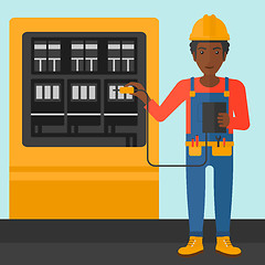 Image showing Electrician with electrical equipment.