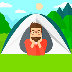 Image showing Man lying in tent.