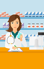 Image showing Pharmacist taking notes.