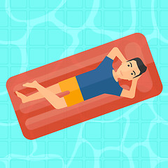 Image showing Man relaxing in swimming pool.