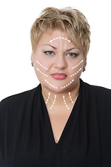 Image showing Portrait of fat woman with arrows on her face