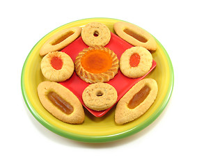 Image showing tarts on a yellow plate