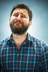 Image showing The crying man with tears on face closeup