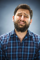 Image showing The crying man with tears on face closeup