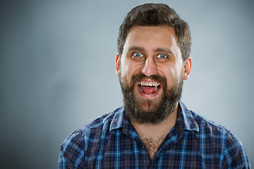 Image showing Closeup headshot portrait, happy handsome business man in blue shirt
