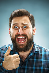 Image showing Closeup headshot portrait, happy handsome business man in blue shirt