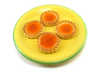 Image showing tarts on a yellow plate