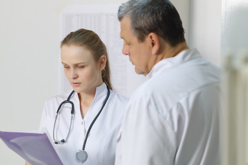 Image showing The nurse reported to doctor about medical tests.