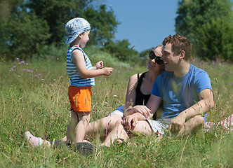 Image showing Family outdoor on a bright summer day