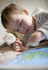 Image showing Boy using touchpad