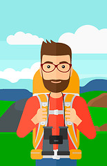 Image showing Cheerful backpacker with binoculars.