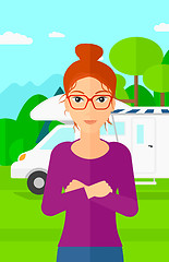 Image showing Woman standing in front of motor home.