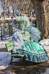 Image showing Person Disguised in a Green Costume