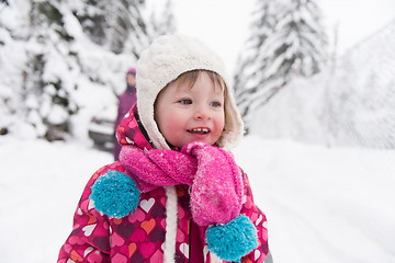 Image showing little girl at snowy winter day