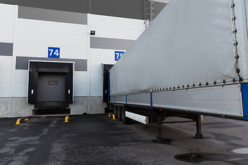 Image showing warehouse gates and truck loading