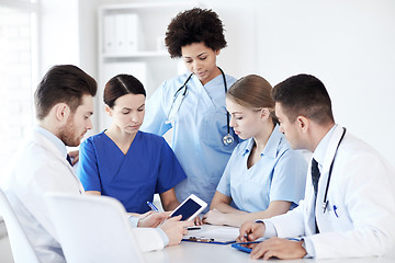 Image showing group of doctors with tablet pc at hospital