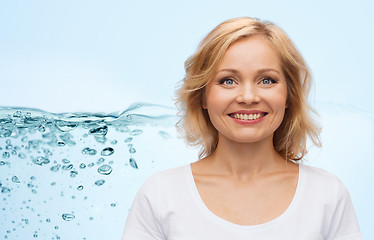 Image showing smiling woman in blank white t-shirt