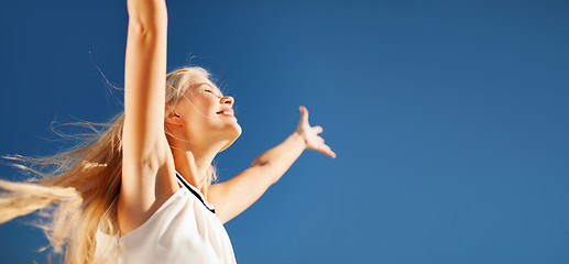 Image showing beautiful woman enjoying summer outdoors