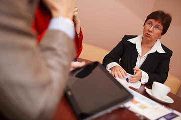 Image showing Businesswoman explaining something in a meeting