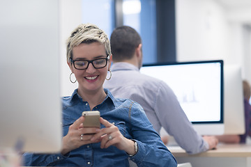 Image showing startup business, woman  working on desktop computer