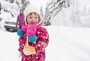 Image showing little girl at snowy winter day