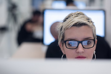 Image showing startup business, woman  working on desktop computer