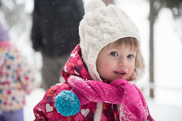 Image showing little girl at snowy winter day
