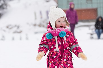 Image showing little girl at snowy winter day