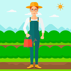 Image showing Farmer with watering can.