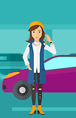 Image showing Woman holding keys from new car.