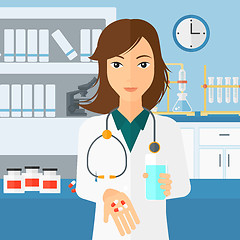 Image showing Pharmacist giving pills.