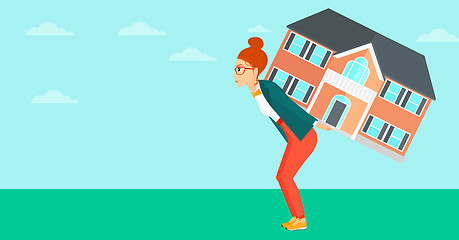 Image showing Woman carrying house.