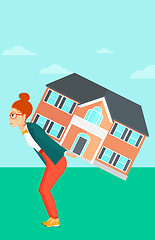 Image showing Woman carrying house.