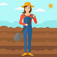 Image showing Farmer on the field with shovel.