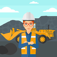 Image showing Miner with mining equipment on background.