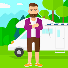 Image showing Man standing in front of motor home.