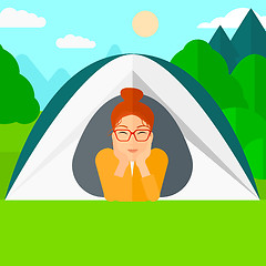 Image showing Woman lying in tent.