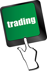 Image showing business concept. Button on Modern Computer Keyboard with Word trading