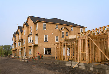 Image showing Housing under construction in various stages of development