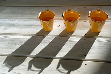 Image showing Shadows on a wooden floor.