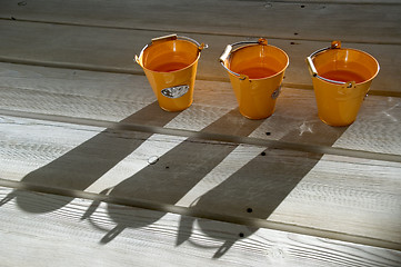 Image showing Shadows on a wooden floor.